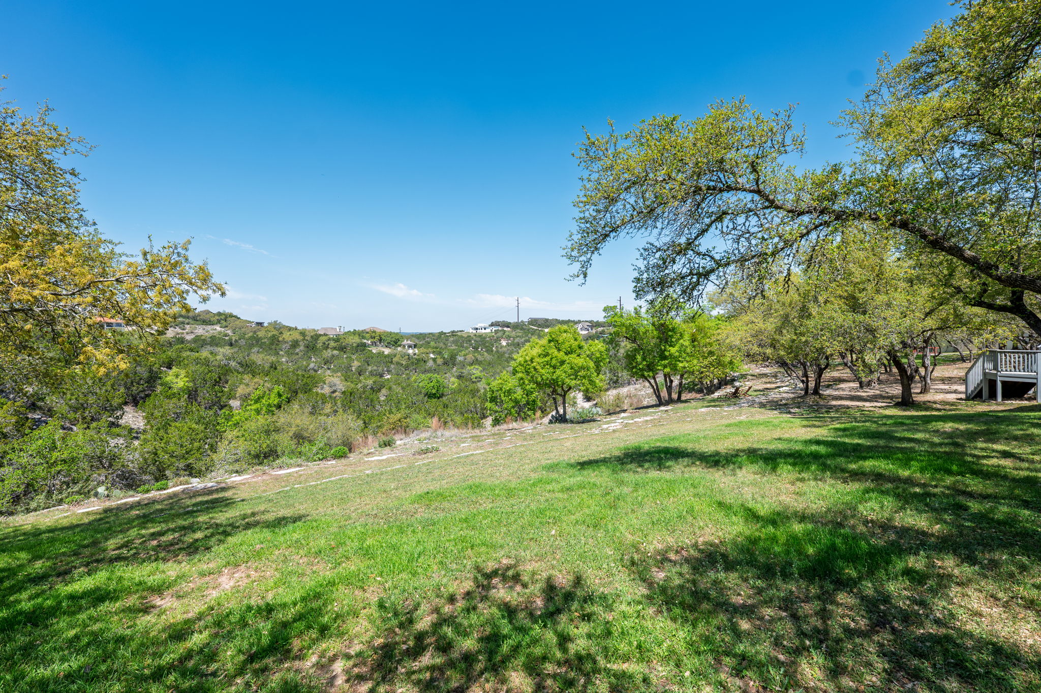 4424 Lago Viento Austin, TX 78734 - Photo 34 of 38 Plenty of room for a pool and the home was built with a pool package for easy hookup for pool equipment. An invisible fence is in place for your four legged friends to roam the property.