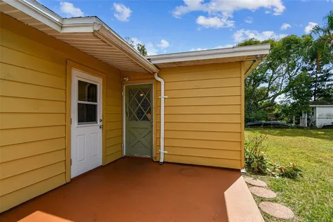 a view of a house with a swimming pool