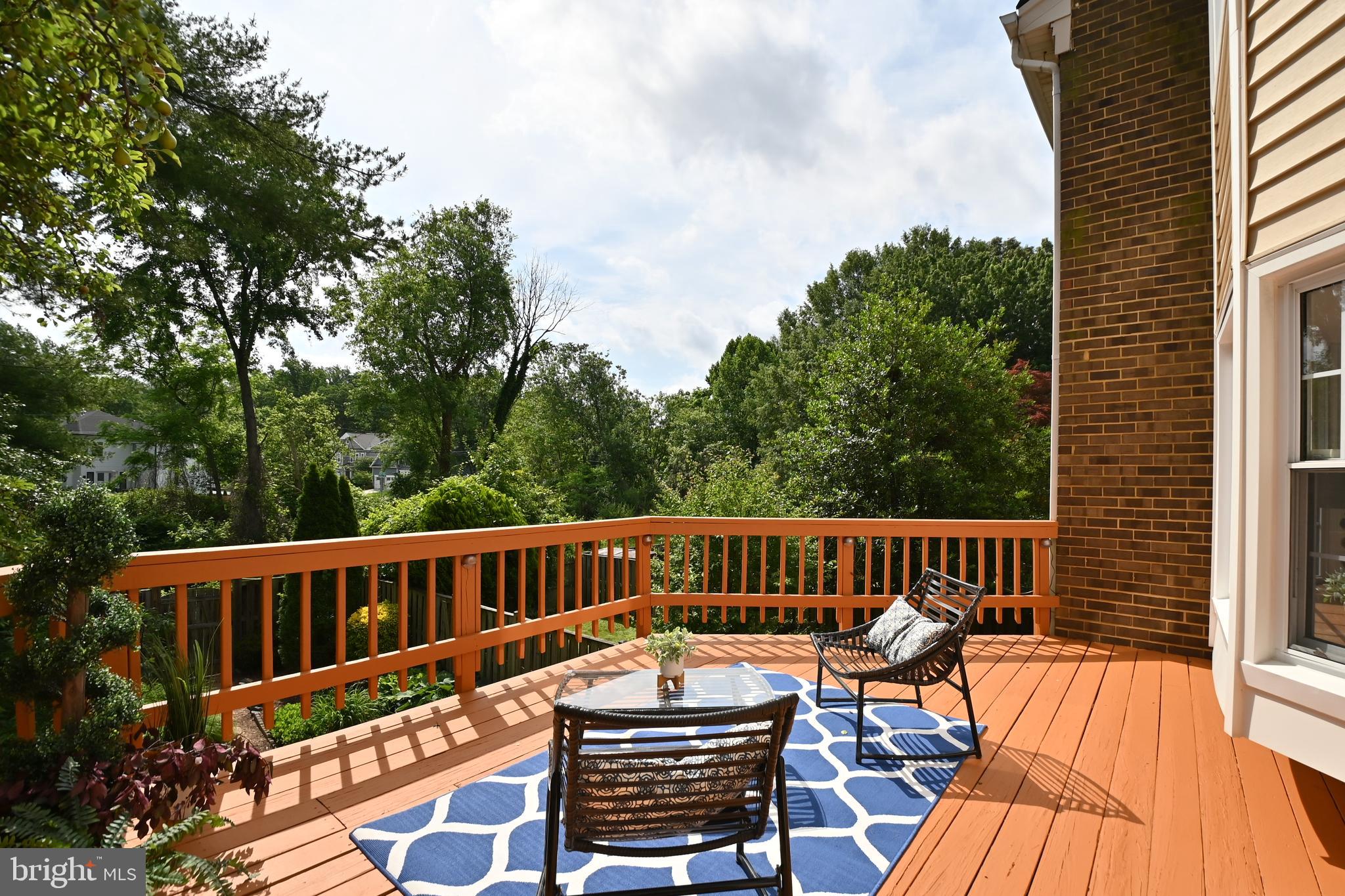 1012 Moorefield Creek Road Southwest Vienna, VA 22180 - Photo 6 of 35 Expanded deck has stair to the fenced yard