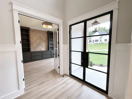 a view of bathroom with sink and mirror