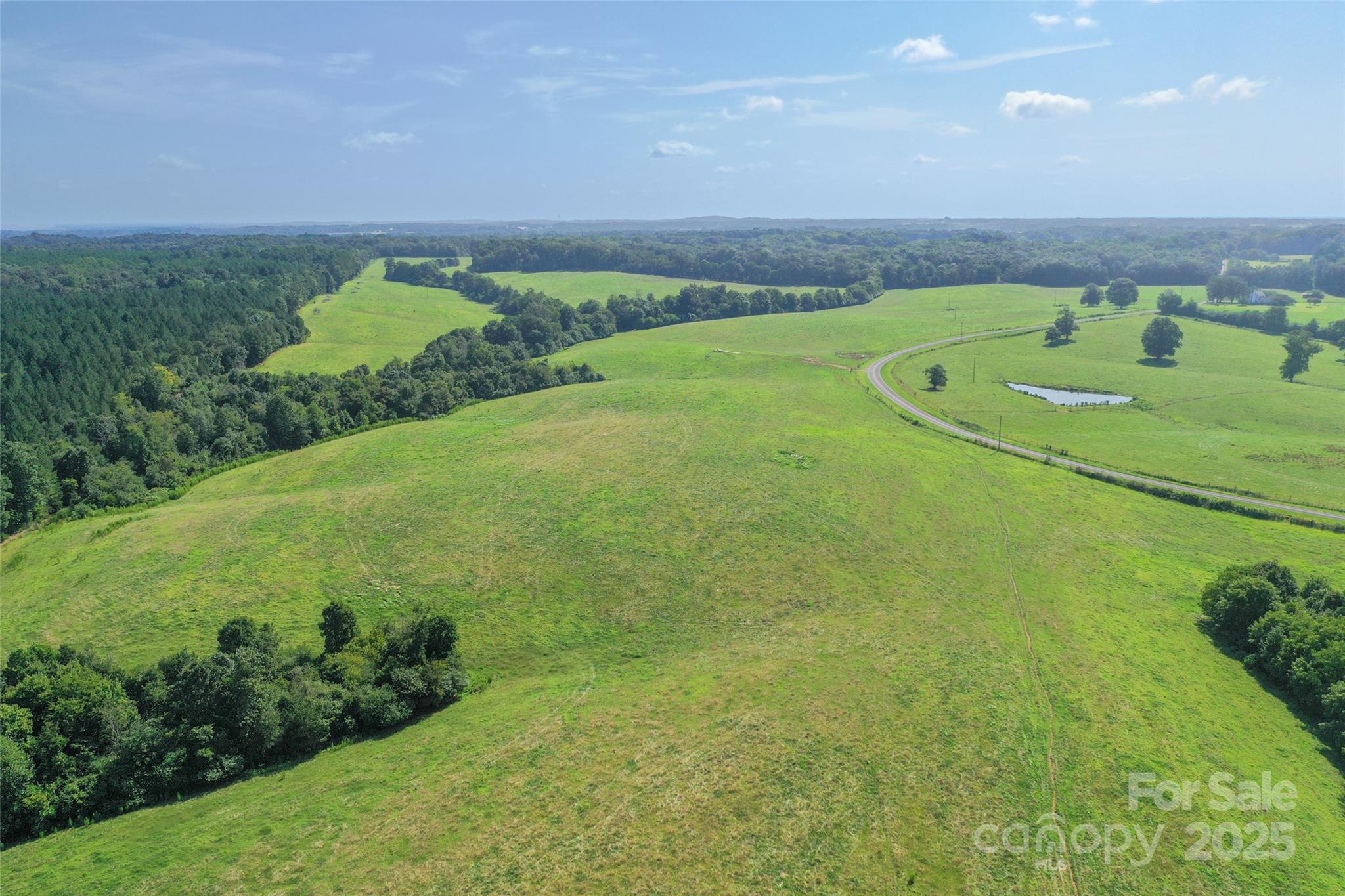 0 Lucy Short Cut Road, Unit D Marshville, NC 28103 - Photo 23 of 23 a view of a golf course with a outdoor space