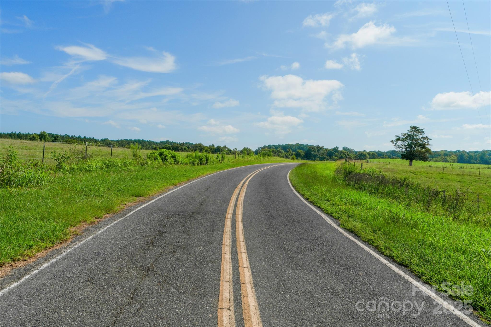 0 Lucy Short Cut Road, Unit D Marshville, NC 28103 - Photo 3 of 23 a view of a golf course with a lake