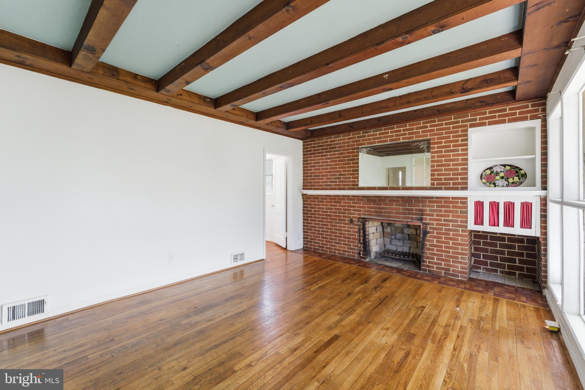 10303 Haywood Dr. Silver Spring, MD 20902 - Photo 8 of 38 Charming space with rustic beams.