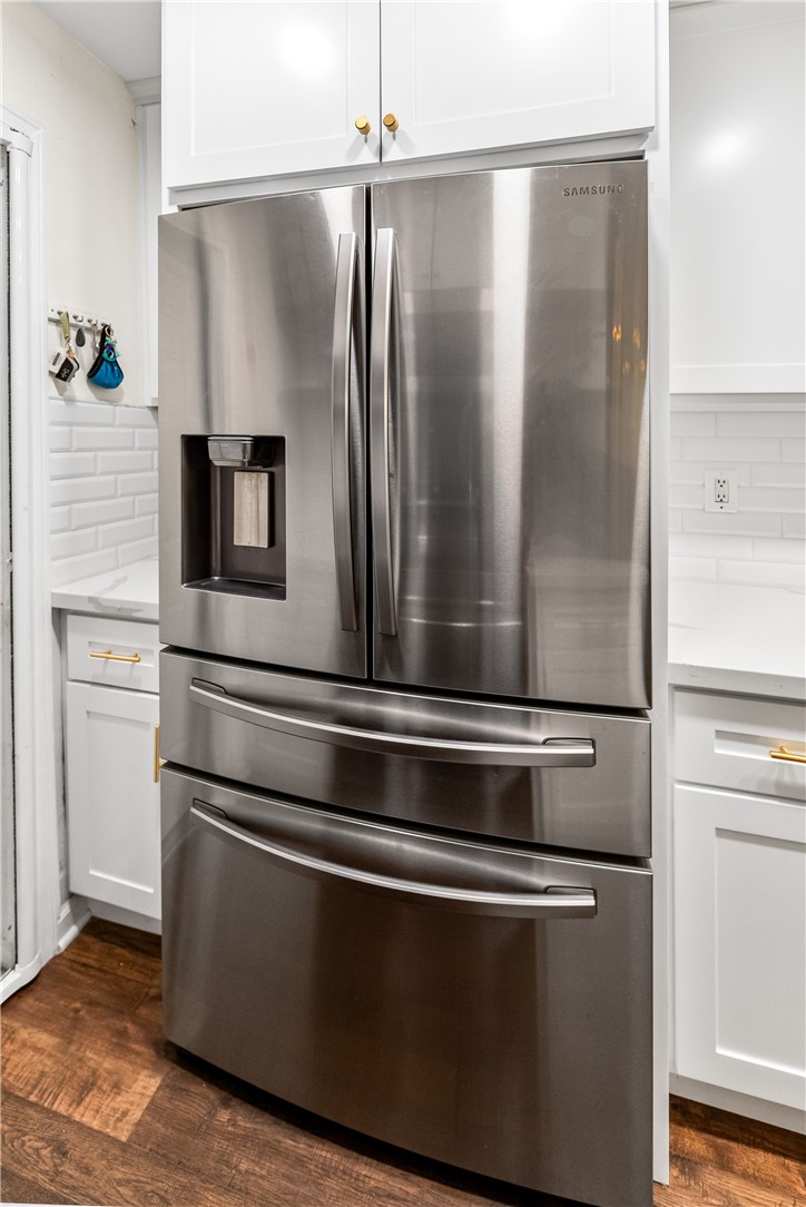 7890 East Spring Street Long Beach, CA 90815 - Photo 23 of 59 a close view of stove and refrigerator in kitchen