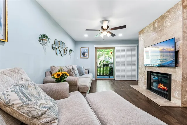 a view of a street with a flower garden