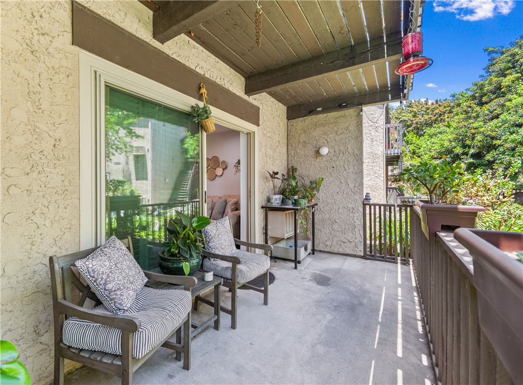 7890 East Spring Street Long Beach, CA 90815 - Photo 30 of 59 a view of two chairs in the balcony
