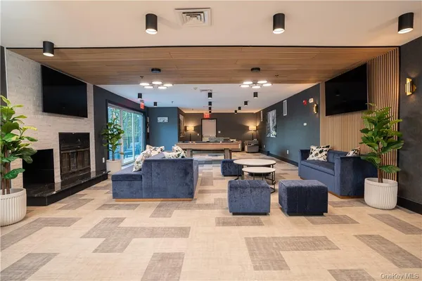 a kitchen with a sink and a refrigerator