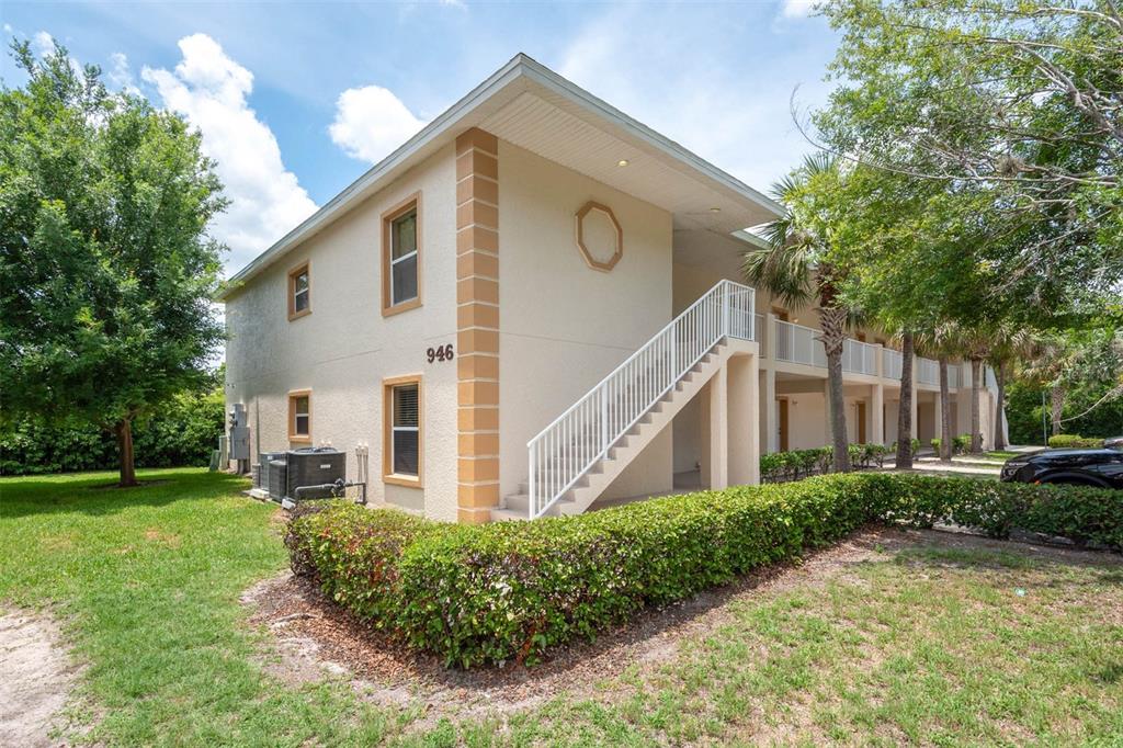 946 15th Street, Unit 202 Daytona Beach, FL 32117 - Photo 1 of 40 a view of backyard with garden