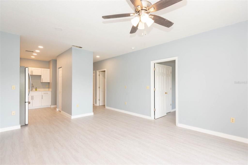 946 15th Street, Unit 202 Daytona Beach, FL 32117 - Photo 40 of 40 a view of an empty room and chandelier fan
