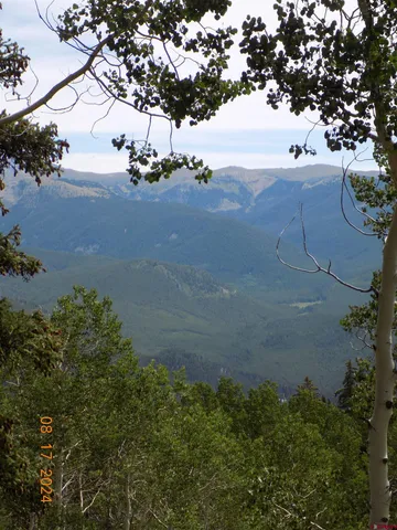 a view of a city street with mountain view