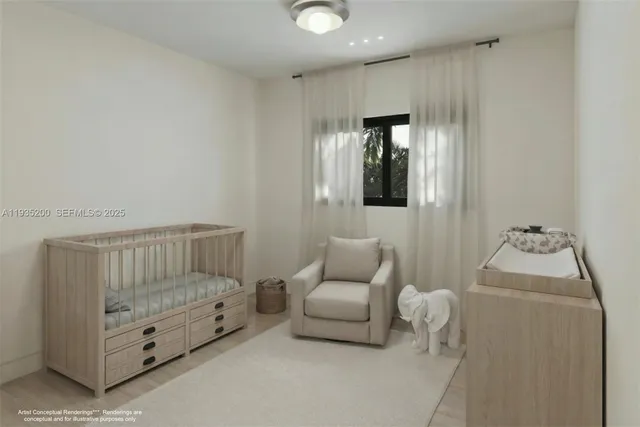 a bedroom with furniture and wooden floor