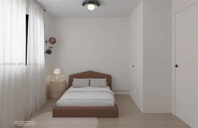 a bedroom with a bed and a table
