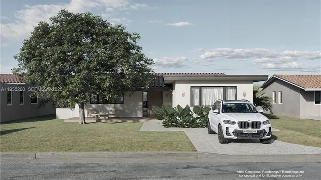 a front view of a house with a garden
