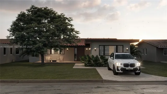 a car parked in front of a house