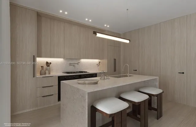 a kitchen with a table chairs stove and sink