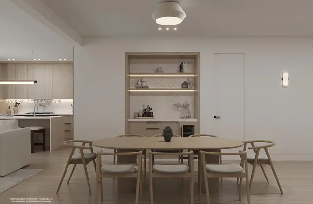 a kitchen with a table and chairs in it