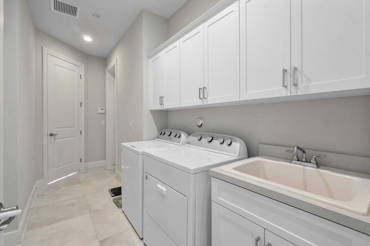 2751 Northwest 70th Boulevard Boca Raton, FL 33496 - Photo 36 of 66 1st floor laundry