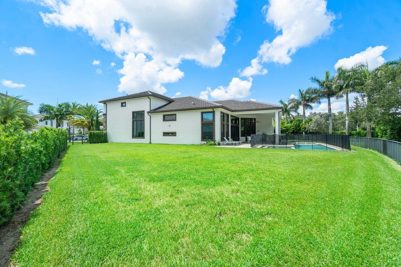 2751 Northwest 70th Boulevard Boca Raton, FL 33496 - Photo 40 of 66 heated pool. huge yard