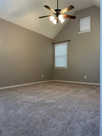 a bathroom with a granite countertop sink vanity and mirror