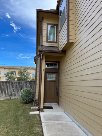 a view of a brick house with a door