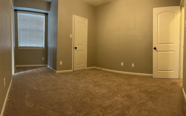 a view of house with a yard