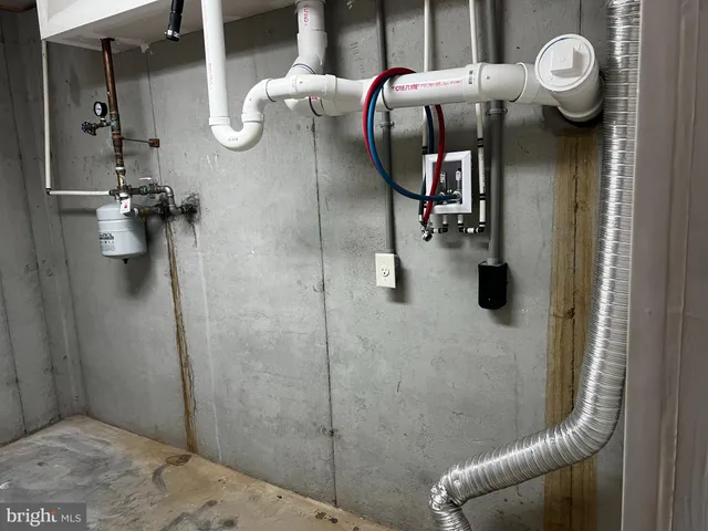 a bathroom with a sink and mirror