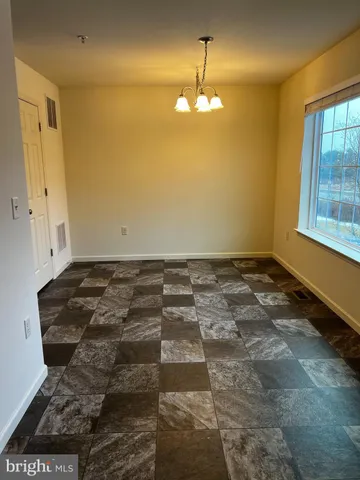 a view of a livingroom with a window