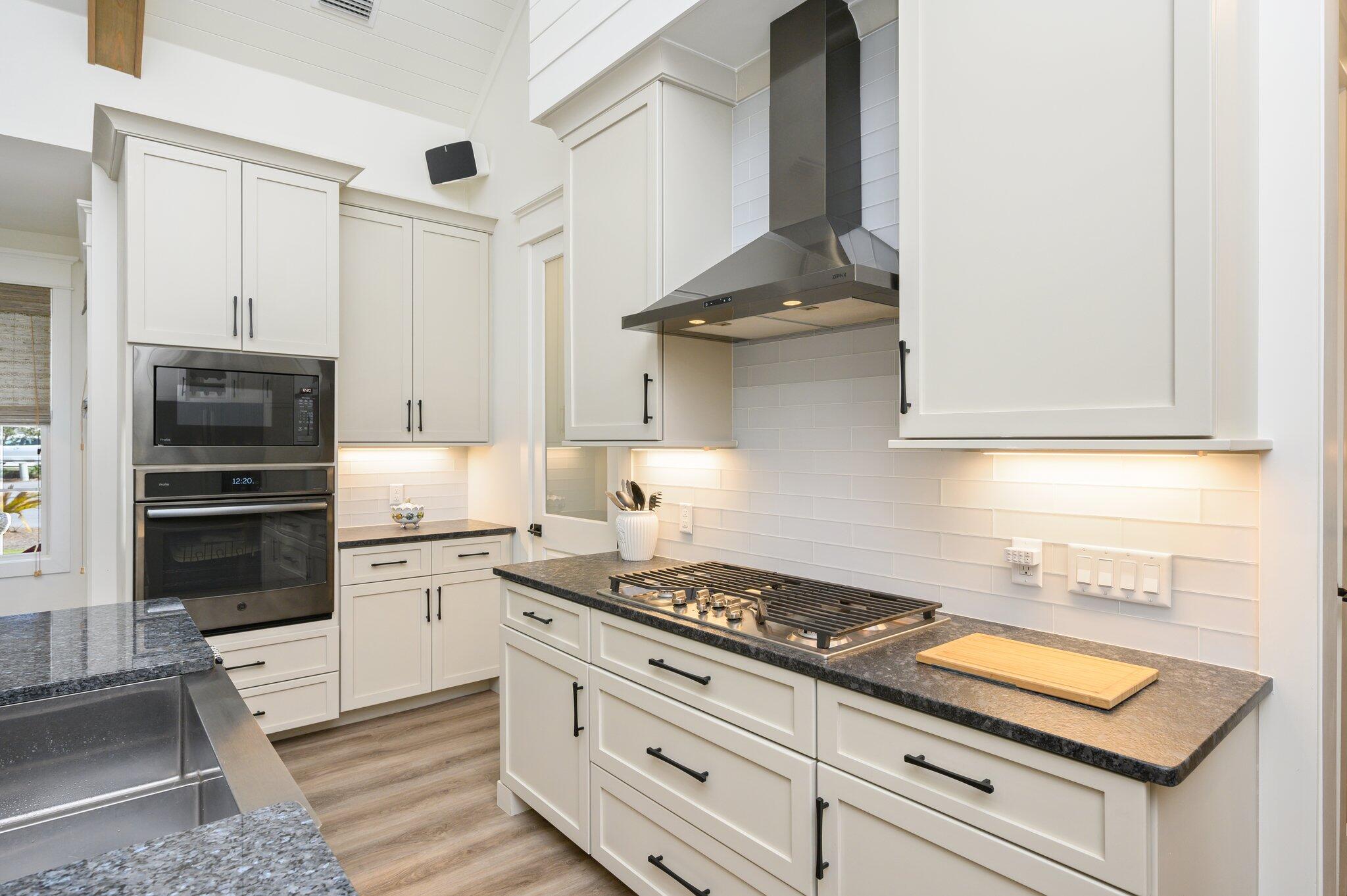 30 Fox Lake Drive Santa Rosa Beach, FL 32459 - Photo 14 of 90 a kitchen with stainless steel appliances granite countertop a sink and a stove