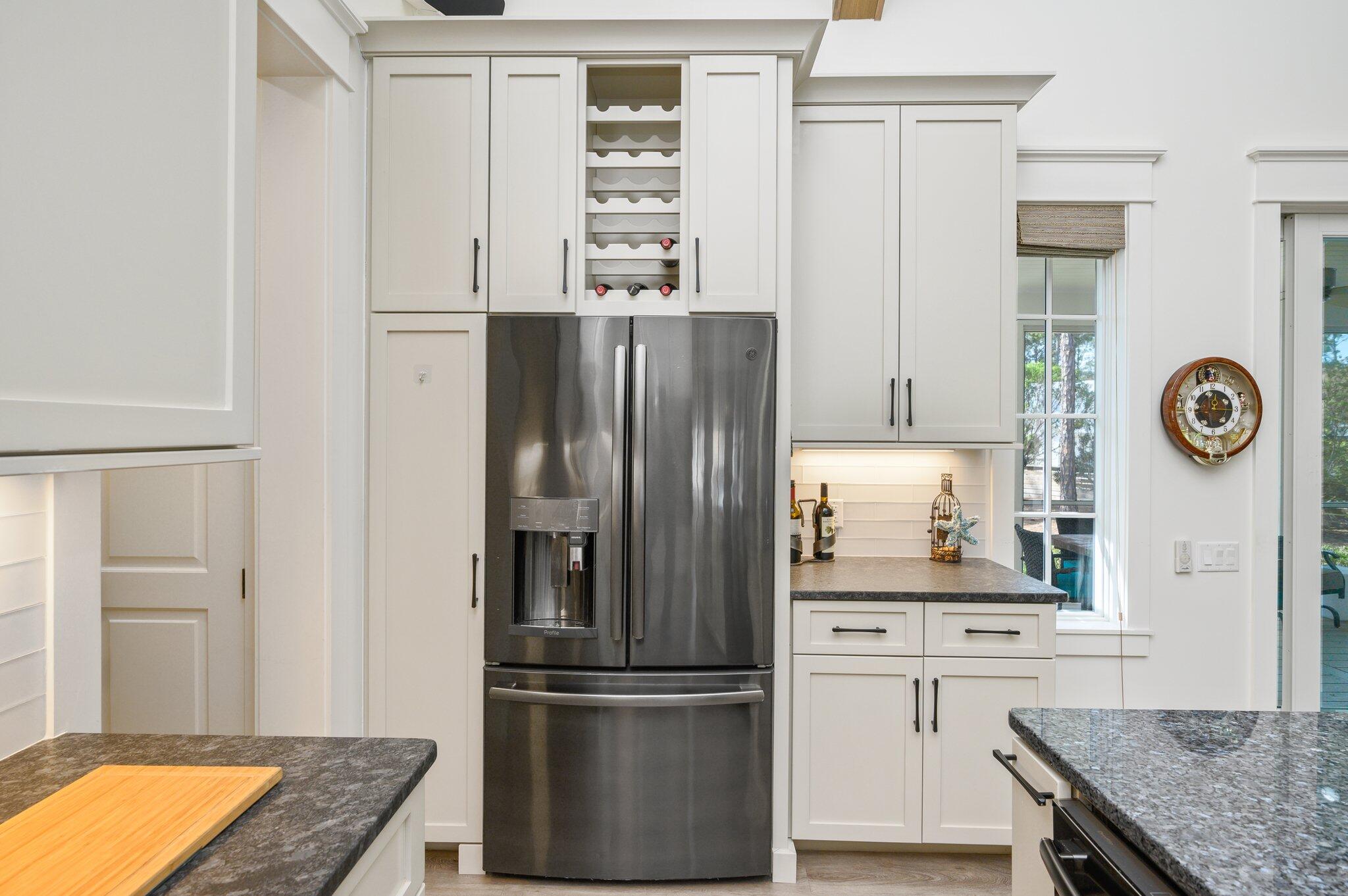 30 Fox Lake Drive Santa Rosa Beach, FL 32459 - Photo 16 of 90 a kitchen with stainless steel appliances granite countertop a refrigerator and a stove