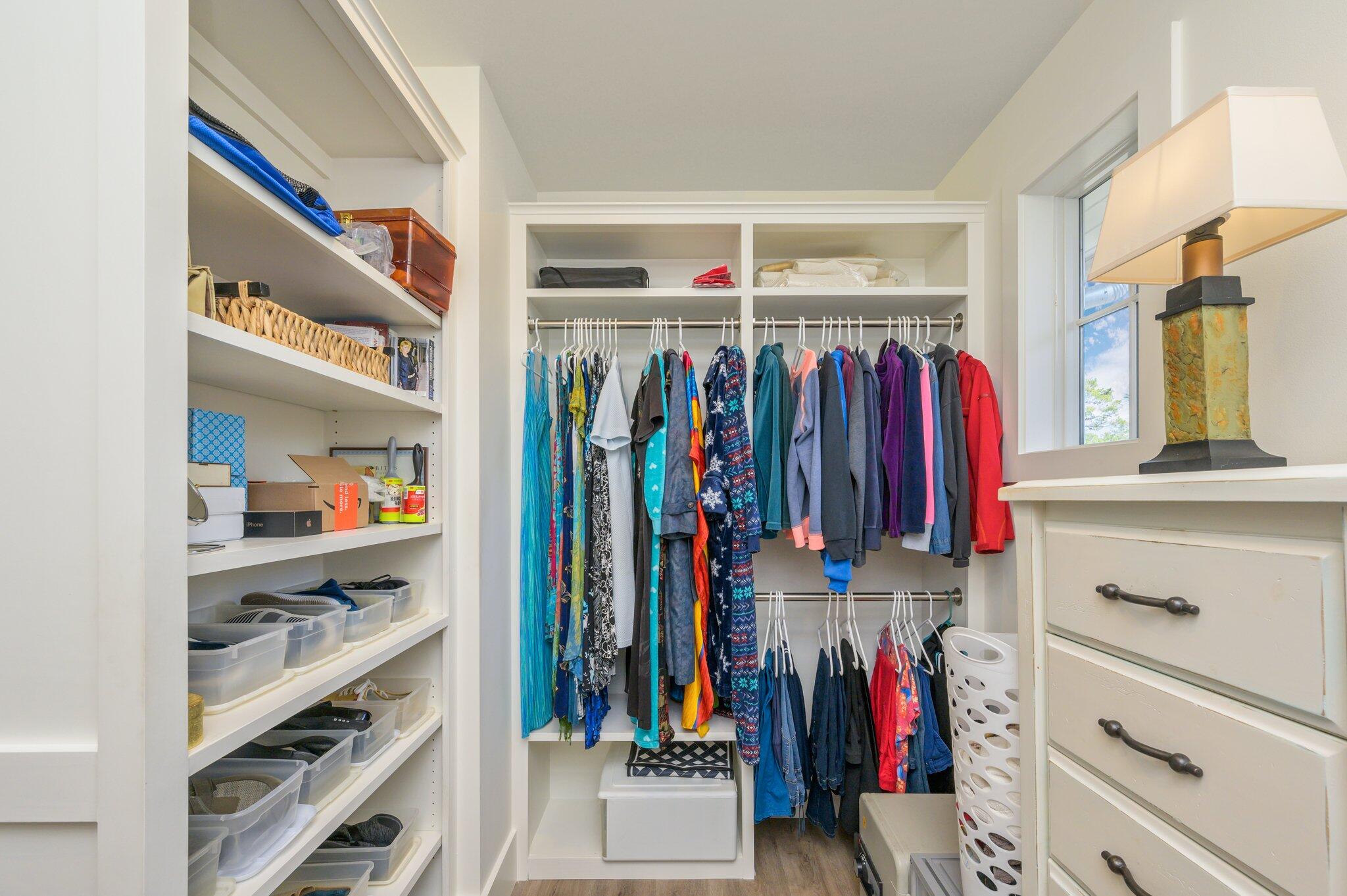 30 Fox Lake Drive Santa Rosa Beach, FL 32459 - Photo 33 of 90 a view of walk in closet with clothes and shoes