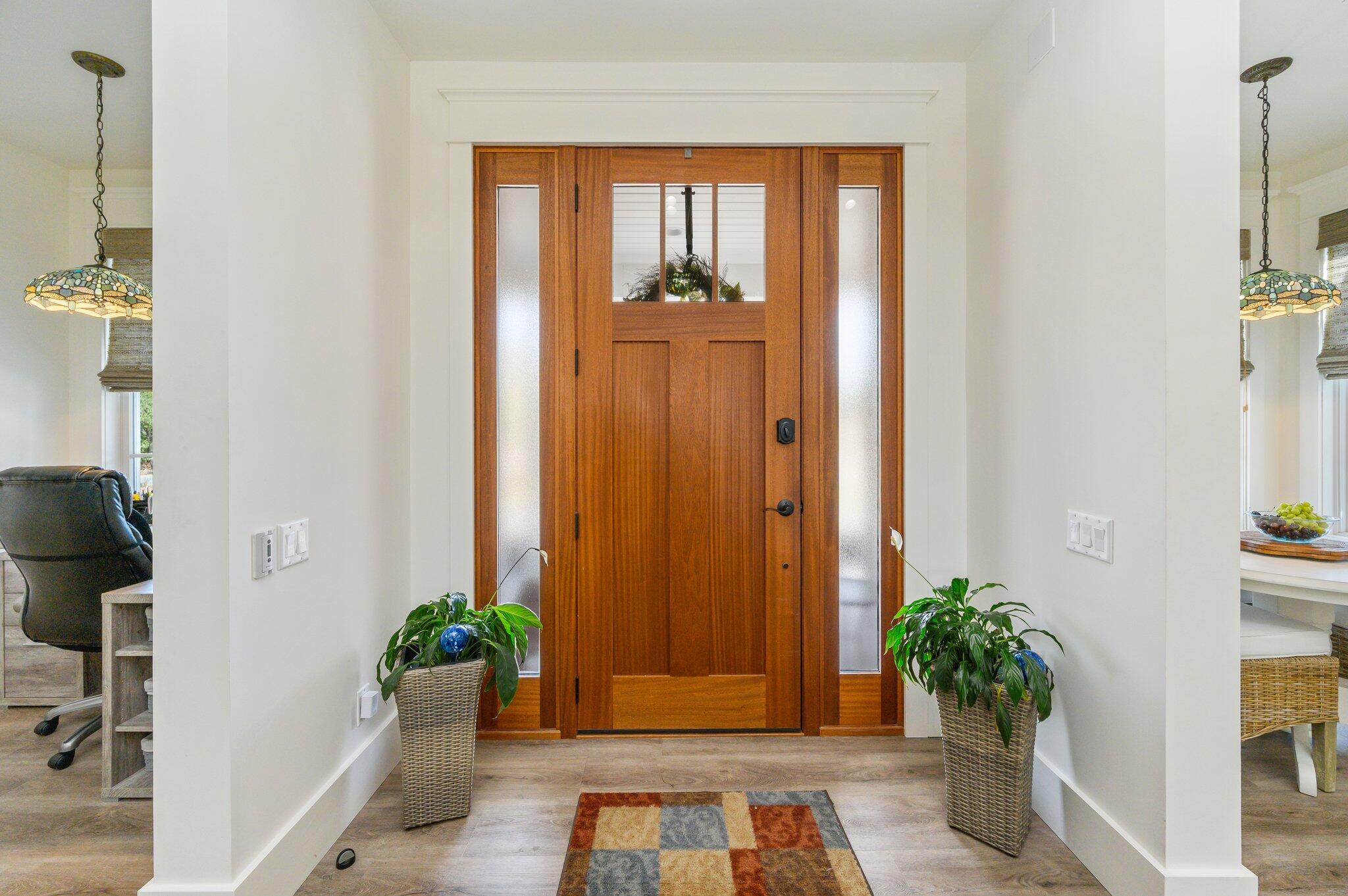 30 Fox Lake Drive Santa Rosa Beach, FL 32459 - Photo 4 of 90 wooden floor with potted plants in front of door