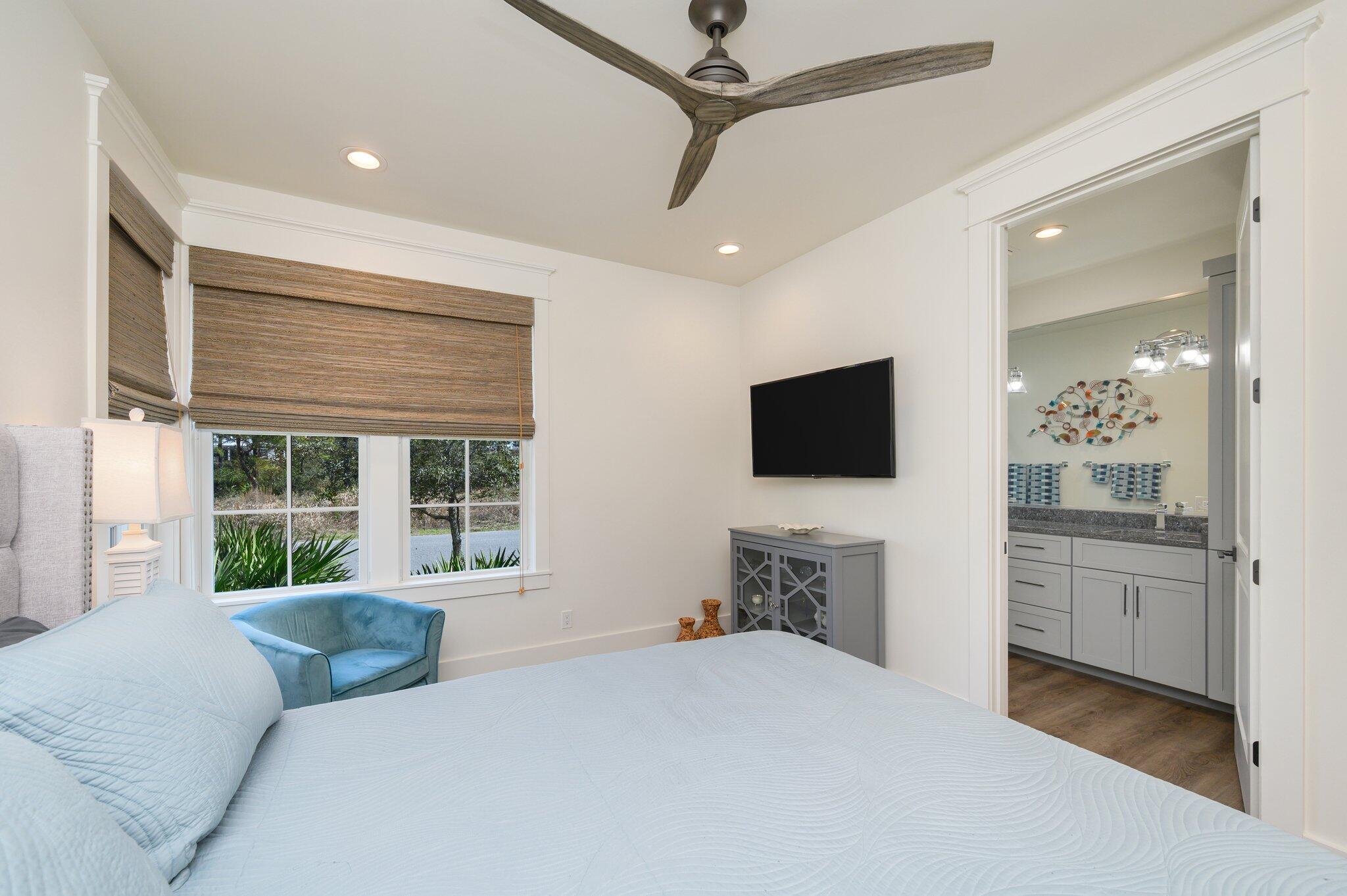 30 Fox Lake Drive Santa Rosa Beach, FL 32459 - Photo 48 of 90 a bedroom with a large bed and a flat screen tv