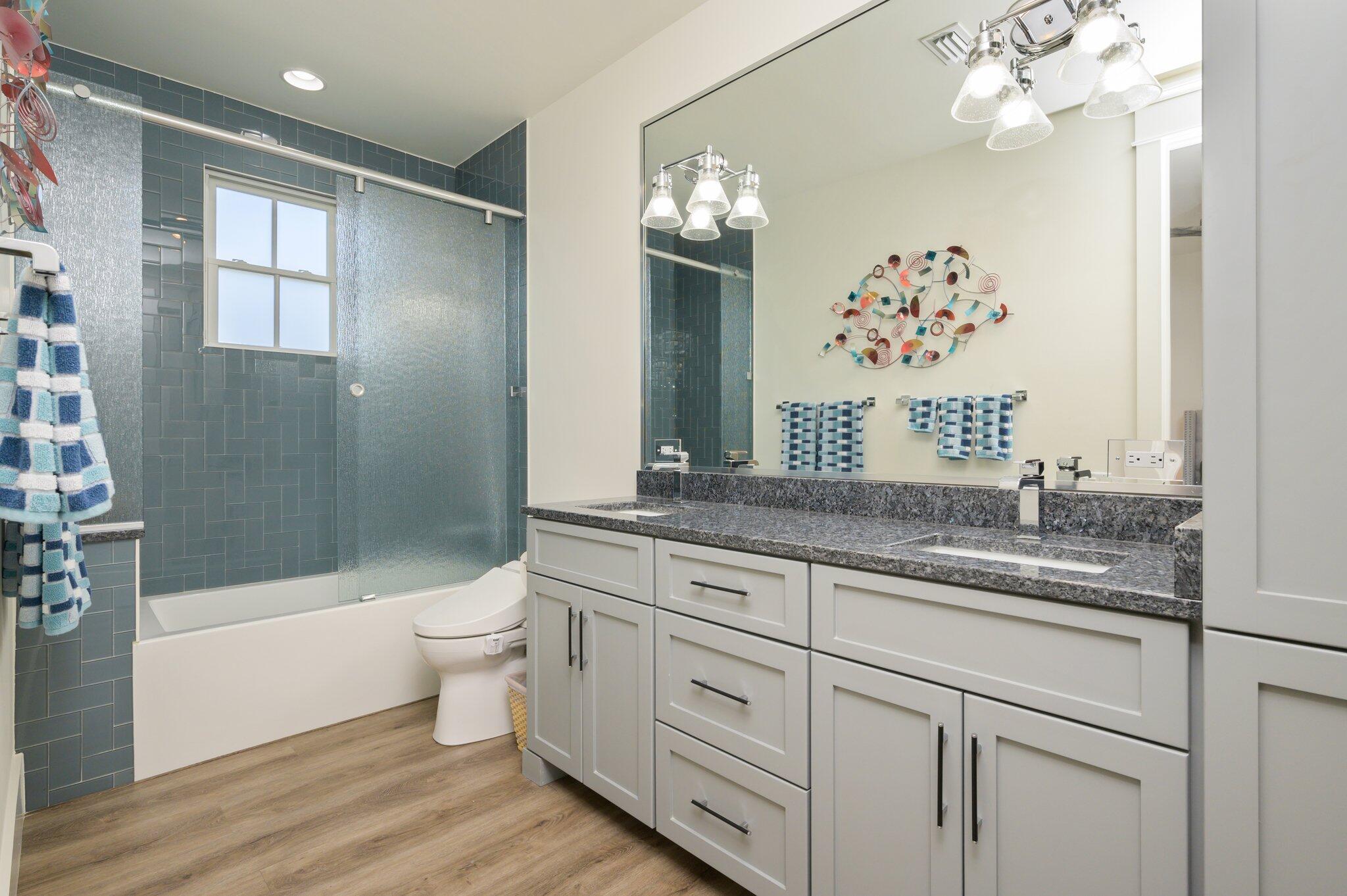 30 Fox Lake Drive Santa Rosa Beach, FL 32459 - Photo 49 of 90 a bathroom with a granite countertop toilet a sink and a bathtub