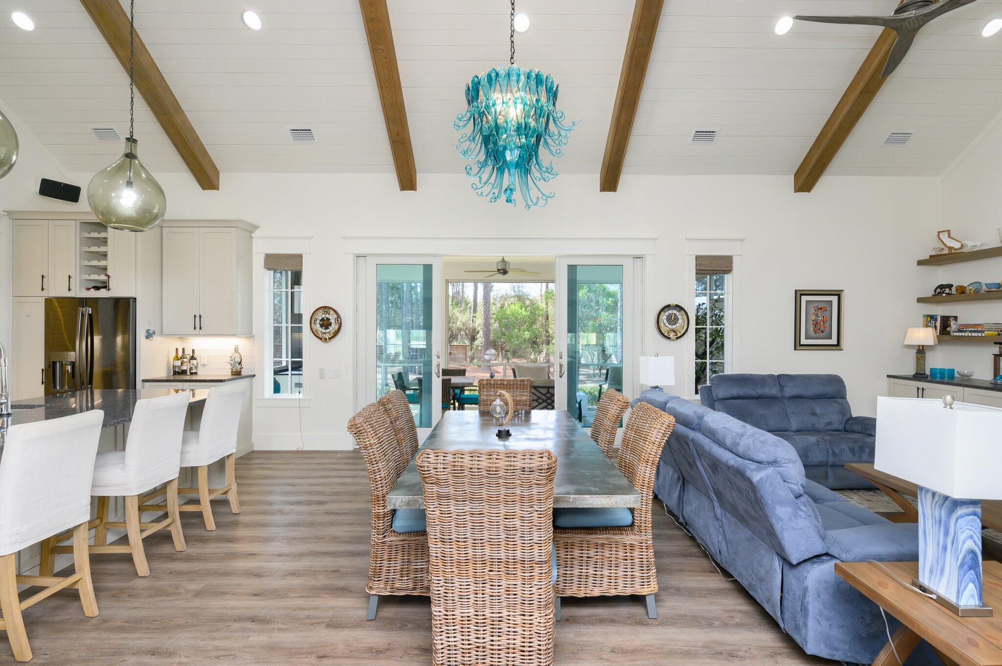 30 Fox Lake Drive Santa Rosa Beach, FL 32459 - Photo 7 of 90 a living room with furniture and a chandelier
