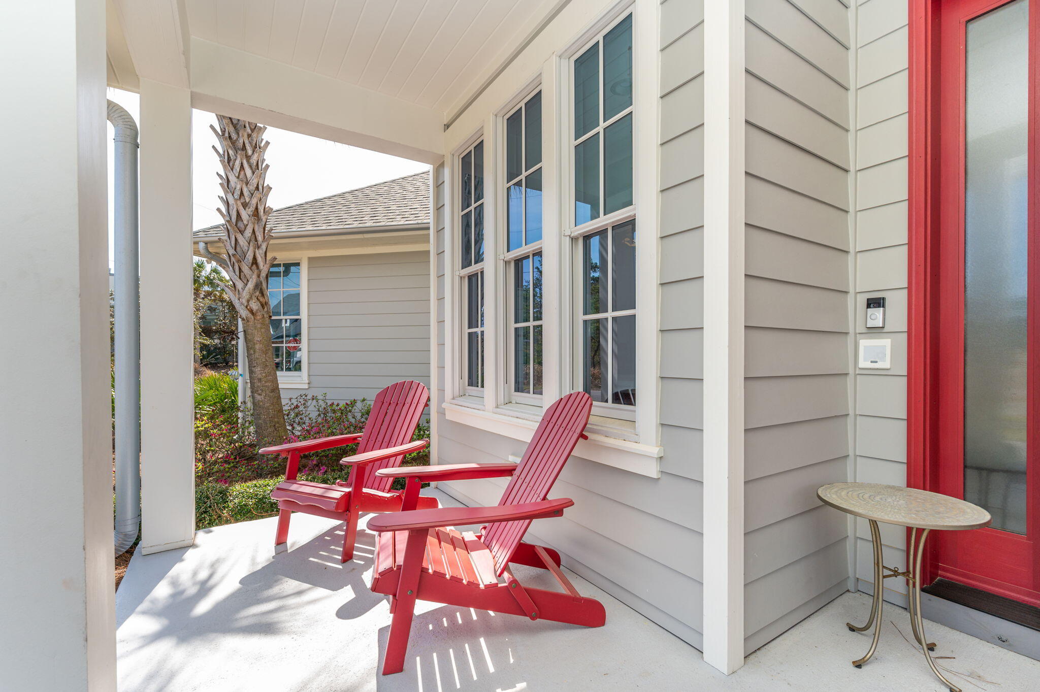 30 Fox Lake Drive Santa Rosa Beach, FL 32459 - Photo 72 of 90 a chair and table in front of a door