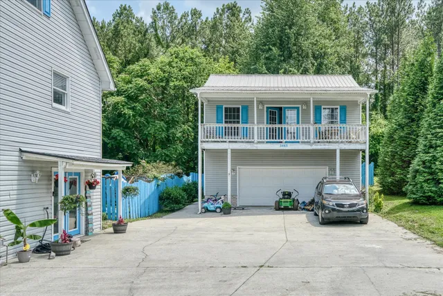 a car parked in front of a house