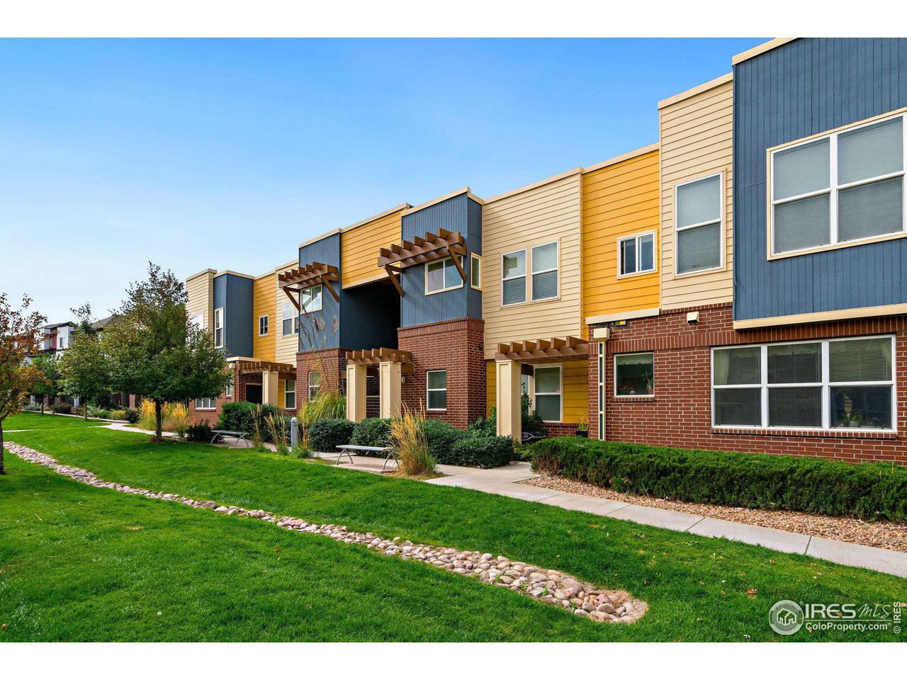 11310 Colony Circle Broomfield, CO 80021 - Photo 2 of 15 a front view of a house with a yard
