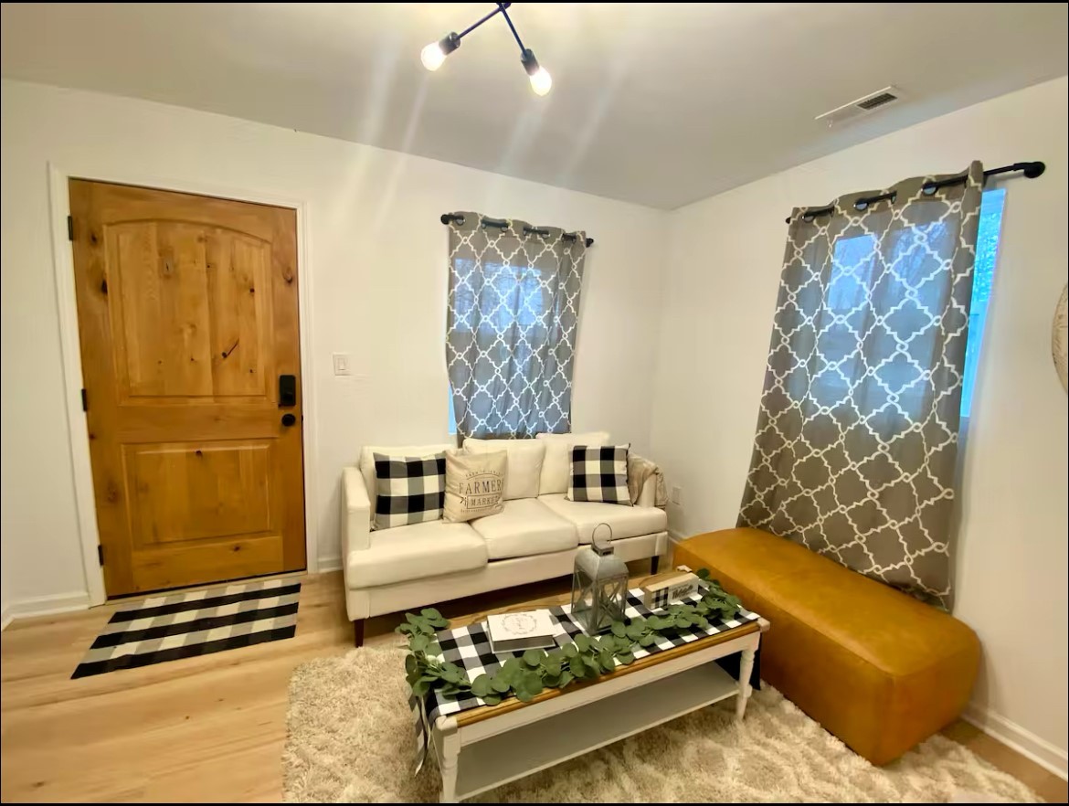 1975 Kelly Road Holladay, TN 38341 - Photo 67 of 95 a living room with furniture and a rug