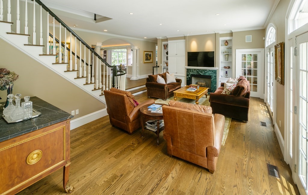 79 Oxbow Road Concord, MA 01742 - Photo 13 of 36 a living room with furniture and a flat screen tv