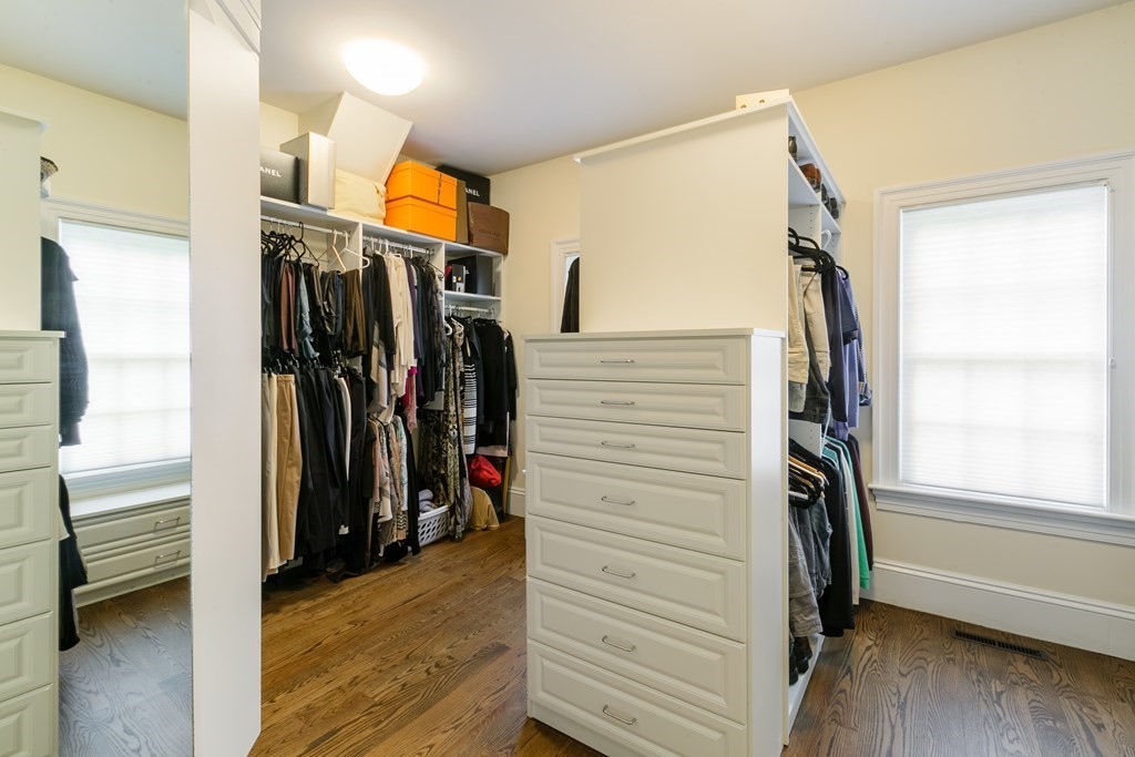 79 Oxbow Road Concord, MA 01742 - Photo 18 of 36 a view of walk in closet with clothes and shoes