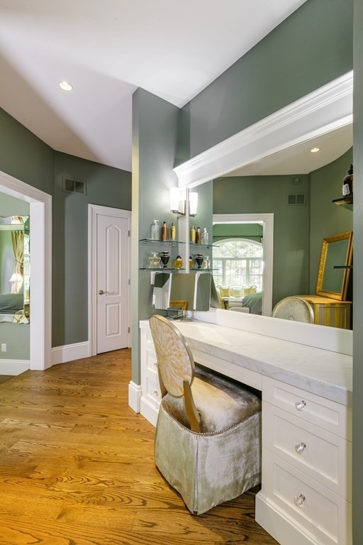 79 Oxbow Road Concord, MA 01742 - Photo 19 of 36 a living room with kitchen furniture and a wooden floor