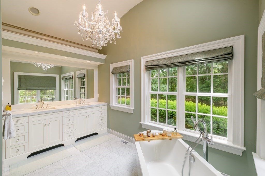 79 Oxbow Road Concord, MA 01742 - Photo 20 of 36 a living room with furniture and a large window
