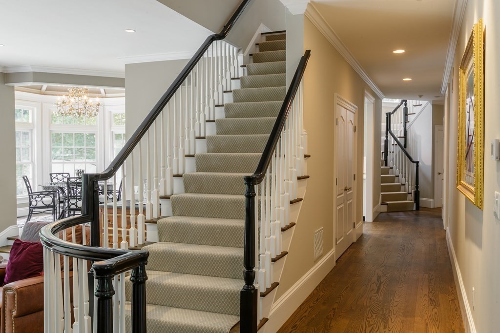 79 Oxbow Road Concord, MA 01742 - Photo 23 of 36 a view of entryway with wooden floor and stairs