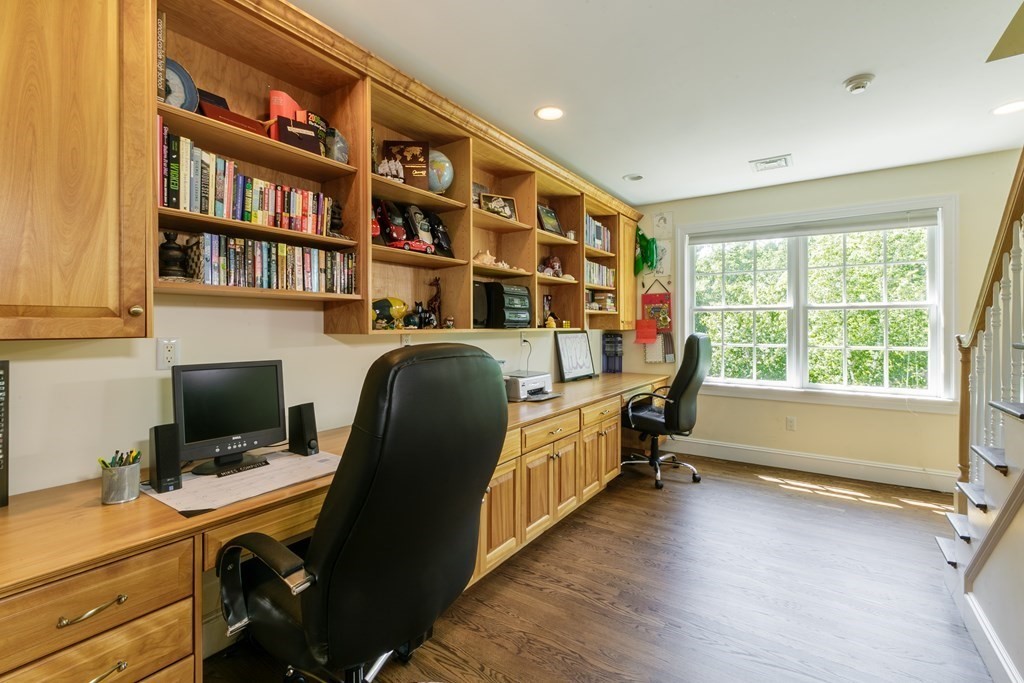 79 Oxbow Road Concord, MA 01742 - Photo 24 of 36 a view of a workspace with furniture and a window