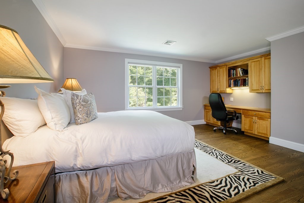 79 Oxbow Road Concord, MA 01742 - Photo 25 of 36 a bedroom with a bed and large windows