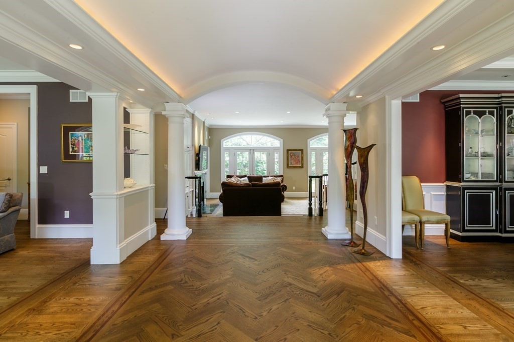 79 Oxbow Road Concord, MA 01742 - Photo 3 of 36 a view of a big room with furniture and a view of living room