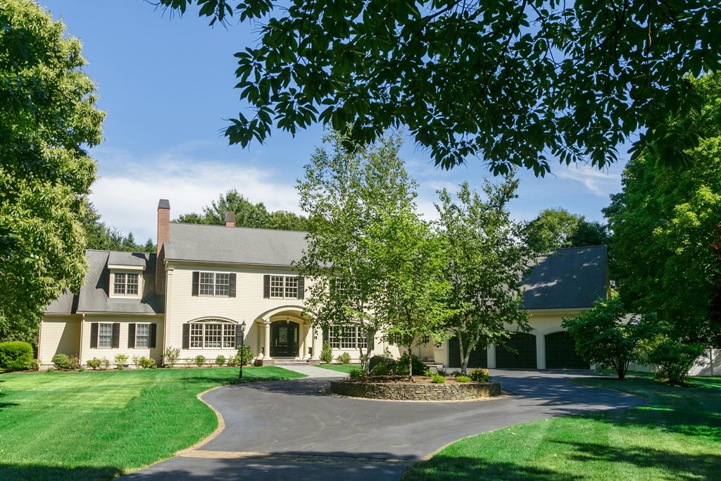 79 Oxbow Road Concord, MA 01742 - Photo 35 of 36 a front view of a house with a yard