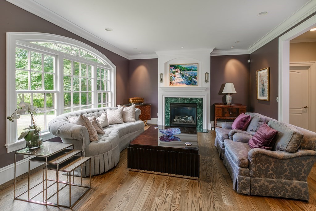 79 Oxbow Road Concord, MA 01742 - Photo 4 of 36 a living room with furniture and a fireplace