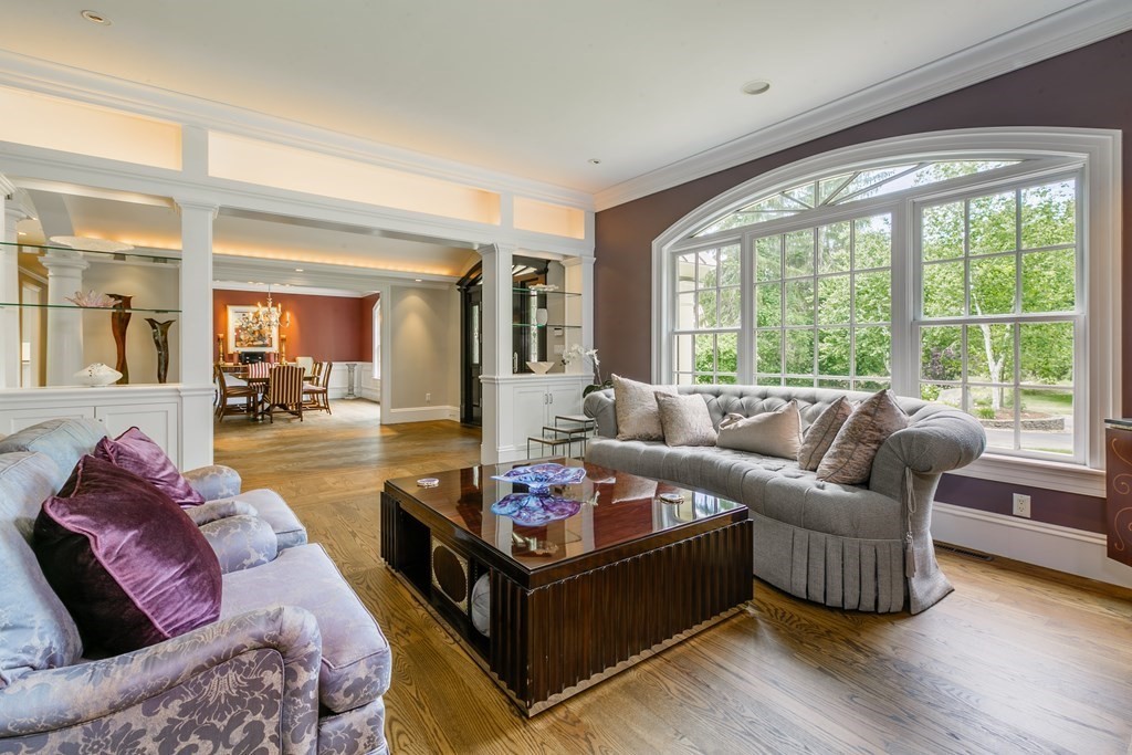 79 Oxbow Road Concord, MA 01742 - Photo 5 of 36 a living room with furniture and a large window
