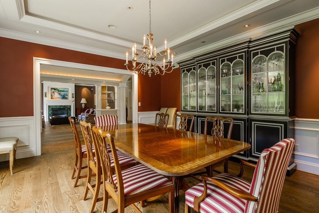 79 Oxbow Road Concord, MA 01742 - Photo 8 of 36 a view of a dining room with furniture window and wooden floor